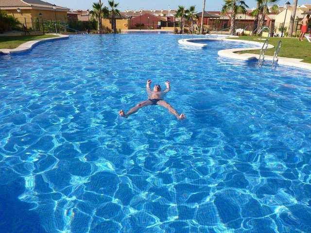 Swimming in the pool of Santa Pola Life Resort, Alicante, Spain